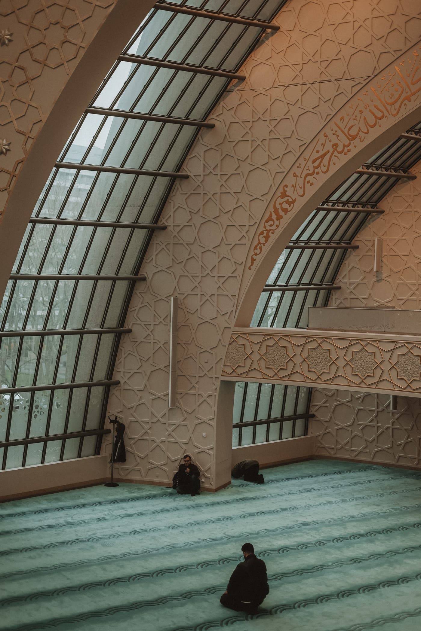 A modern mosque prayer hall with geometric skylights