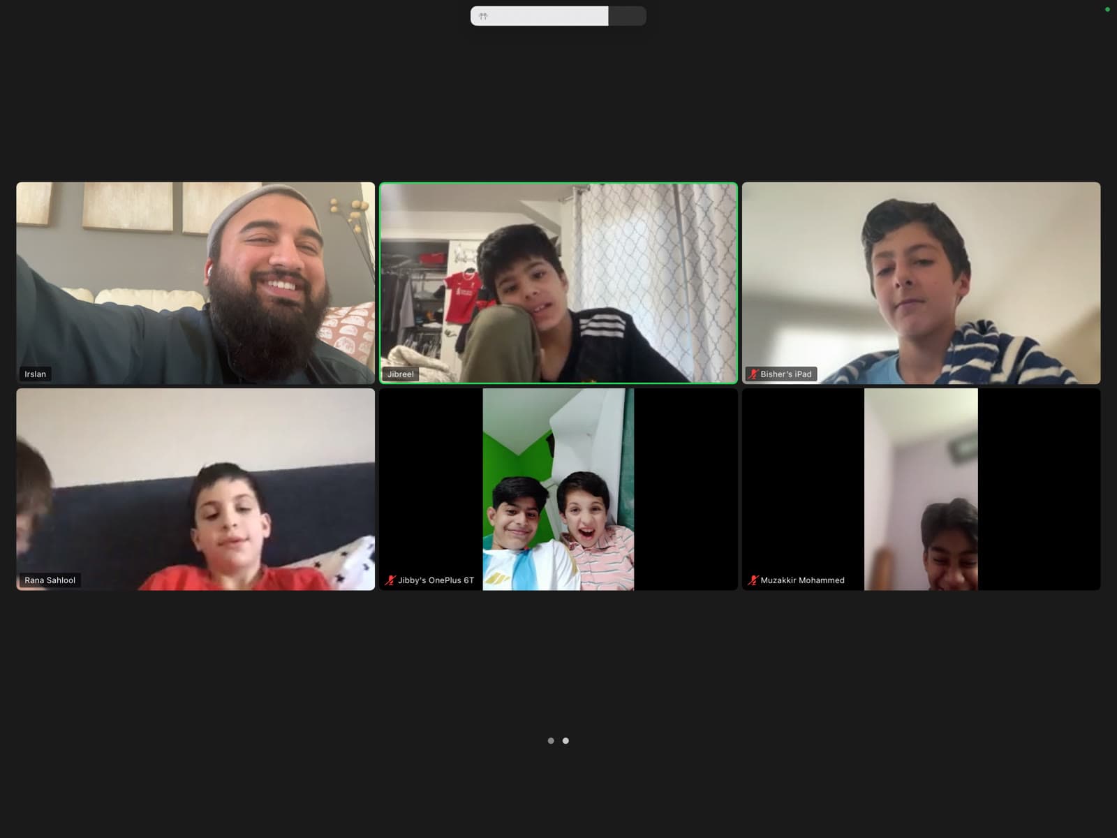 A grid of students and their teacher together on a live online class call